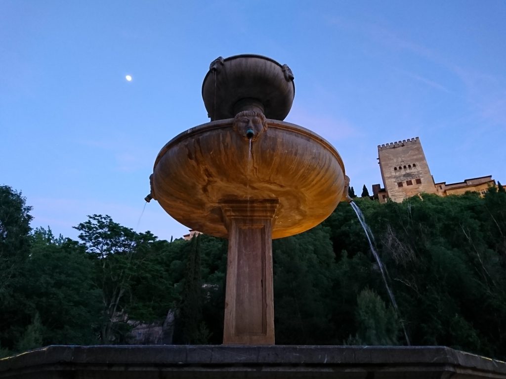 The fountain of Paseo de los tristes in front of Alhambra