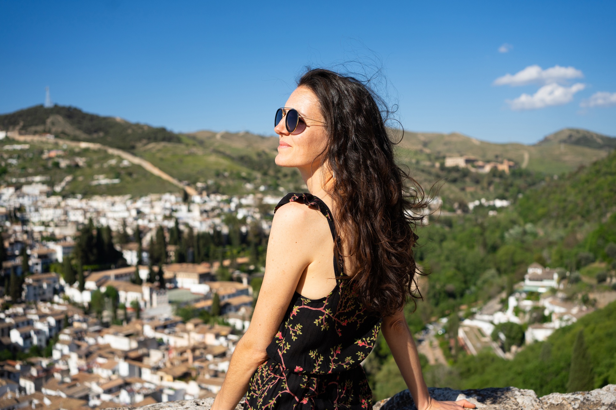 Woman enjoying scenic view in granada, spain